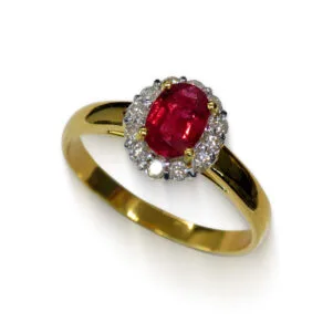 18K yellow gold ring with natural 0.98 ct oval ruby and diamond halo
