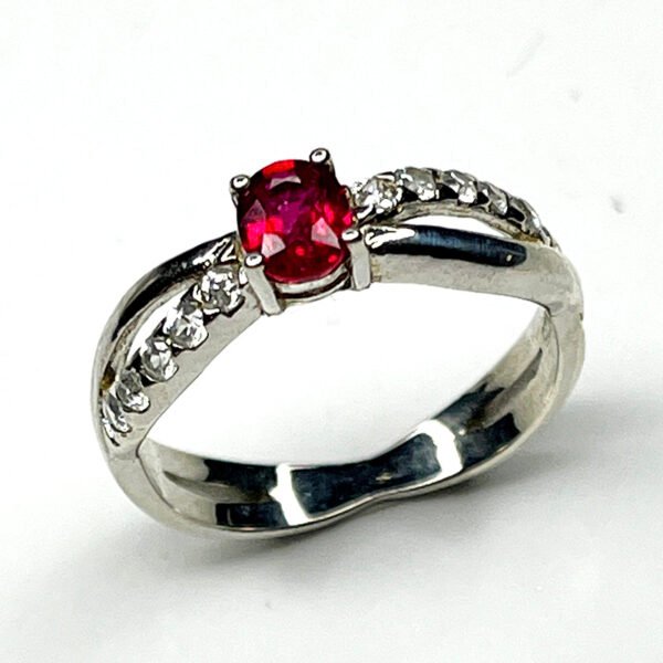 Sterling silver ring with natural treated ruby and white zircon accents