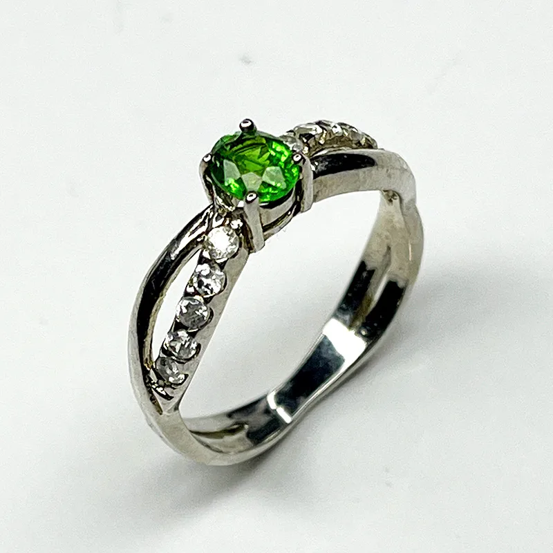 Sterling silver ring with green tsavorite garnet and zircon gemstones