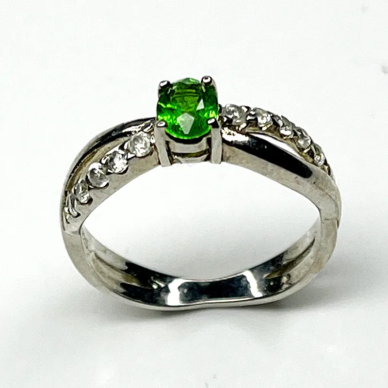 Sterling silver ring with vivid green tsavorite garnet and natural white zircon