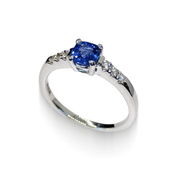 Elegant 18K White Gold Cushion-Cut Sapphire Ring with Diamonds – Angled View