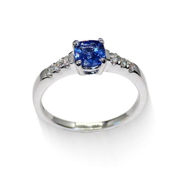 Luxury 18K White Gold Blue Sapphire Ring (0.71 ct) with Diamond Details – Front View